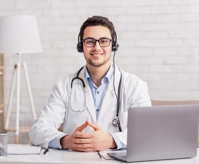 health-blog-young-doctor-in-headphones-sitting-at-2021-08-28-09-00-32-utc-Custom.jpeg